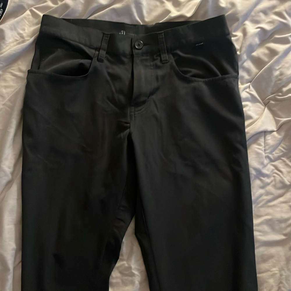 Travis Mathew pants open to close